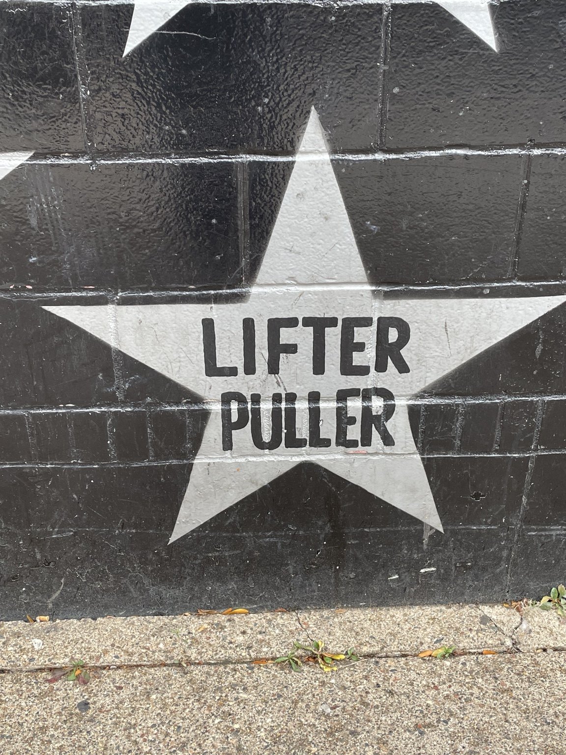 Lifter Puller star on the First Avenue exterior wall